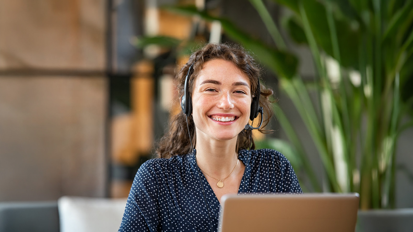 Student and parent talking with staff